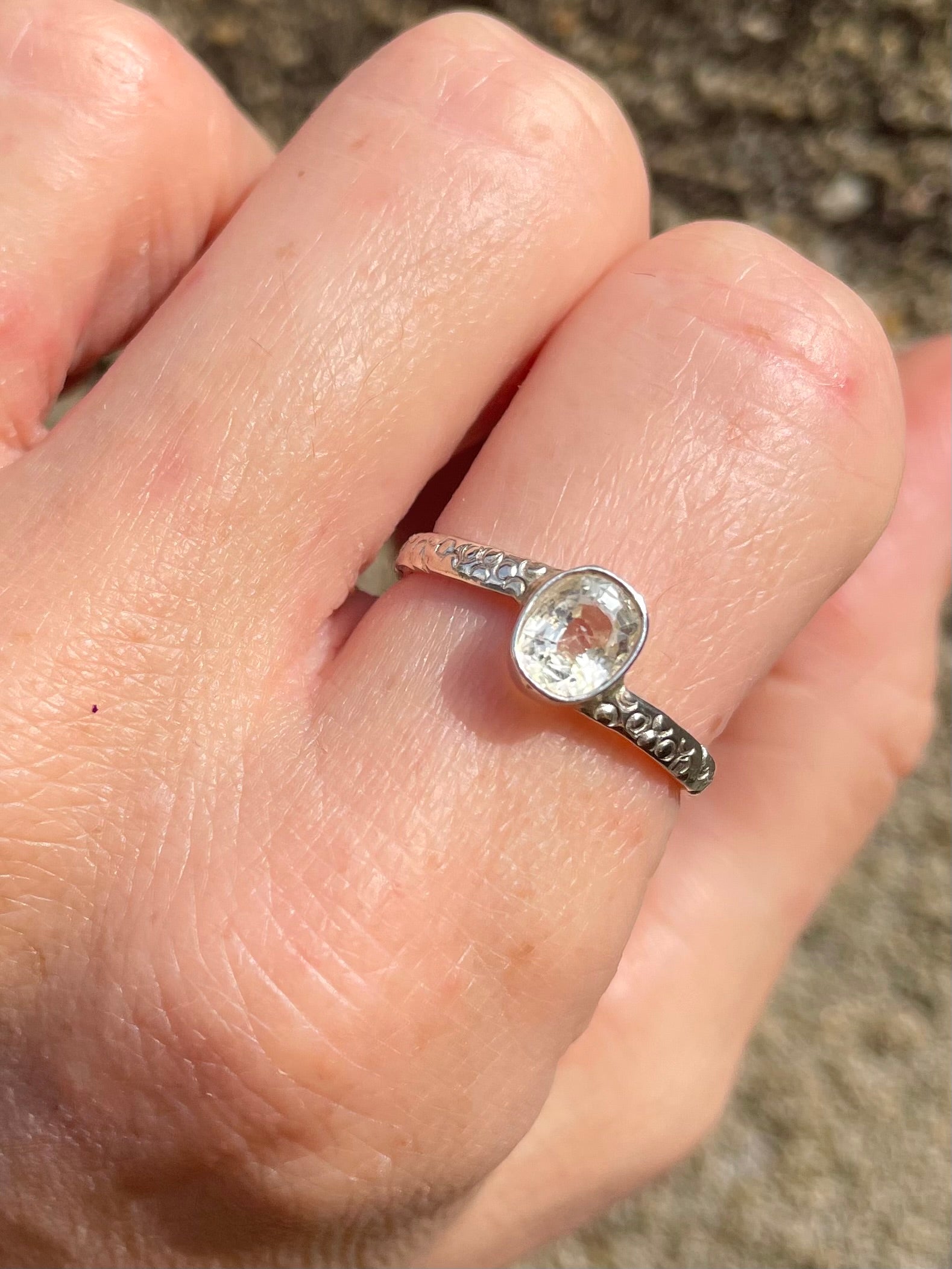 Size 7 White Sapphire silver band ring made by artisans in Sri Lanka