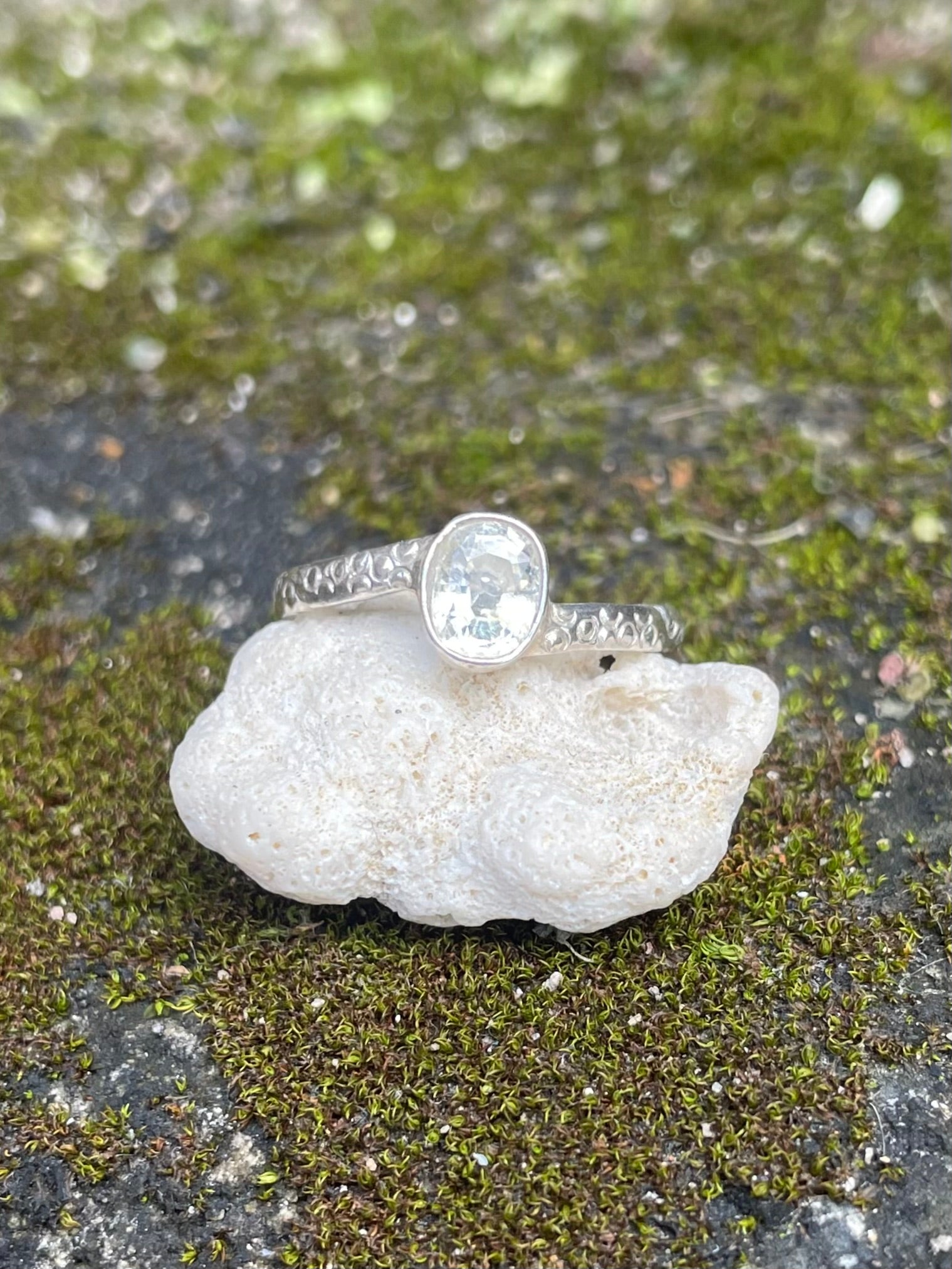 Silver engraved band with white Sri Lankan Sapphire size 7 made by Sri Lankan artisans with Fair Trade principles