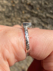 Profile of White Sapphire and silver ring on hand in Sri Lanka size 7