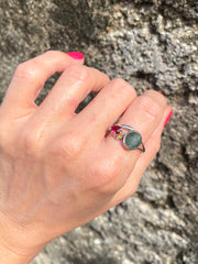 Indian Catseye, Yellow Quartz & Garnet Silver Ring displayed on a hand made in Sri Lanka