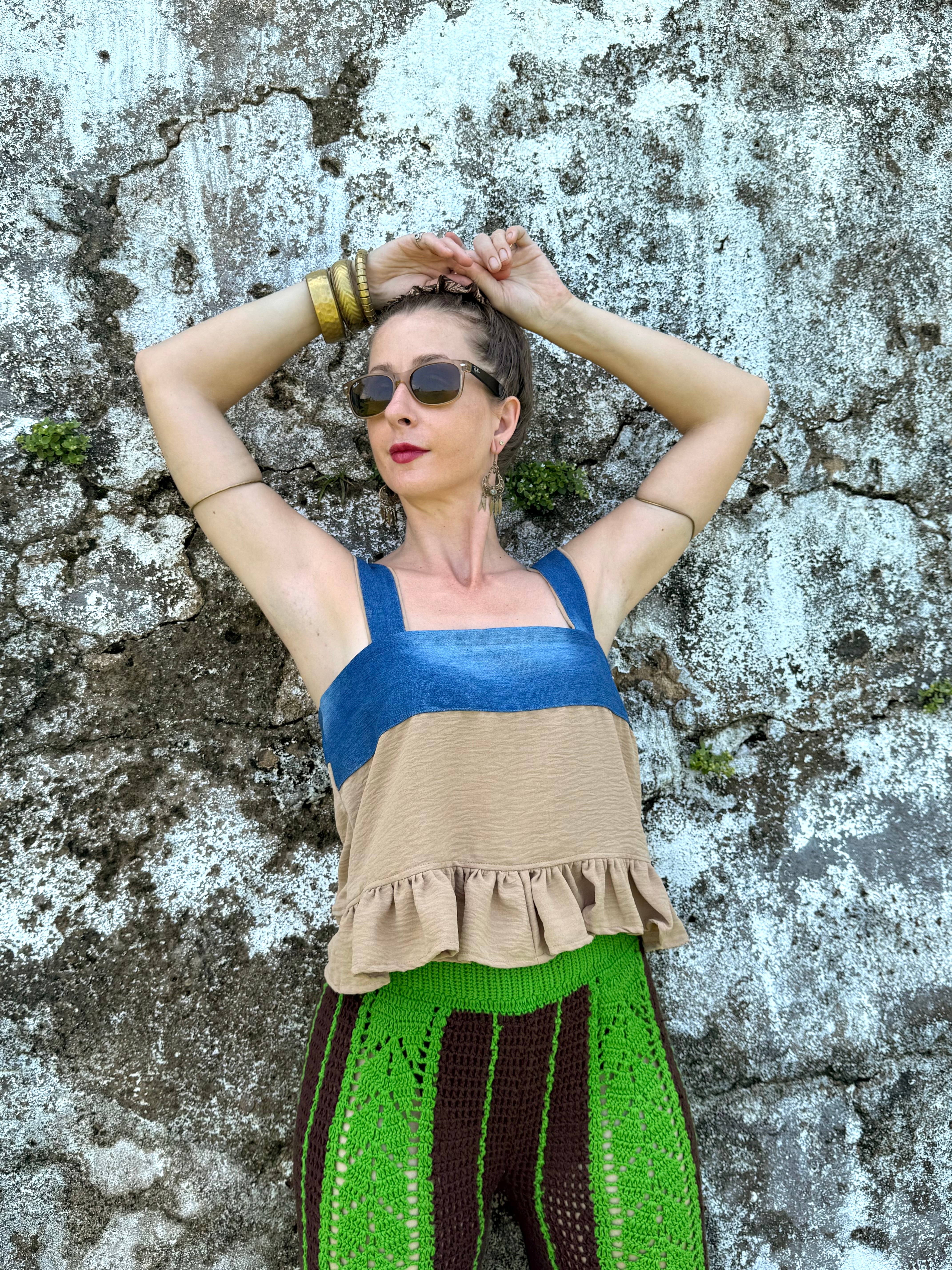 Woman wearing crochet 70s pants with Retro Baby Doll Top from upcycled denim & kakhi pants
