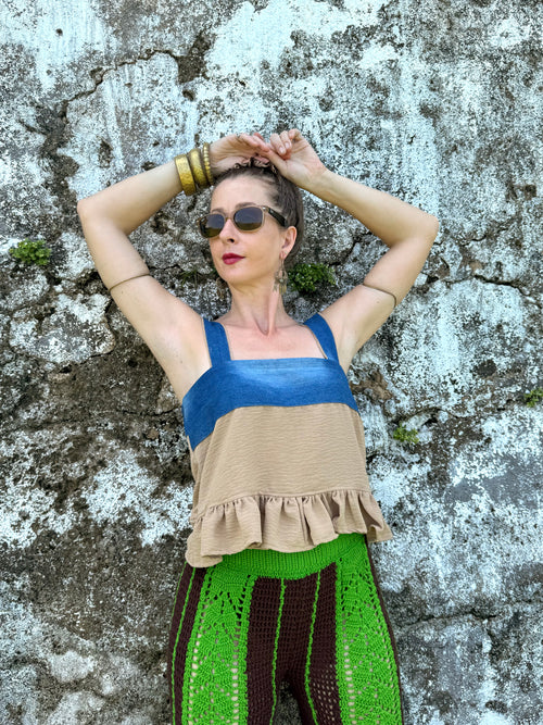 Woman wearing crochet 70s pants with Retro Baby Doll Top from upcycled denim & kakhi pants