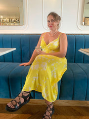 Sitting down in Sandenie Dress handmade in Sri Lanka - ethical and sustainable fashion - made by local artisans - yellow tie dye cotton
