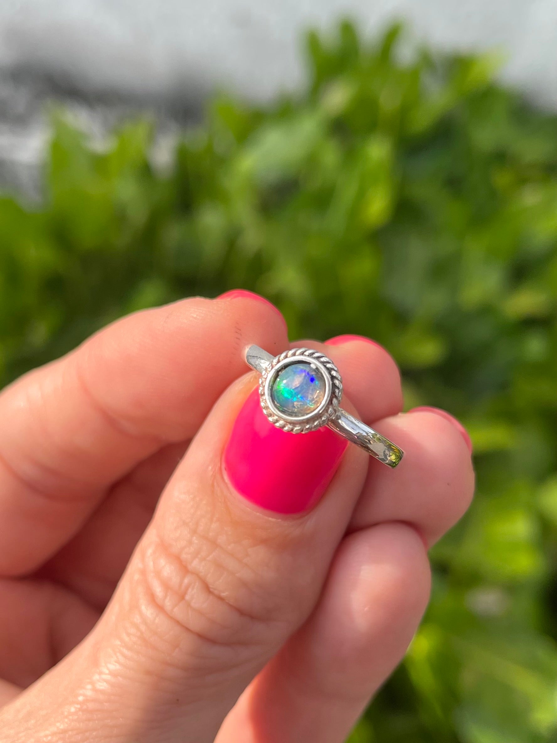 Sri Lankan opal and silver dainty ring close up of the details